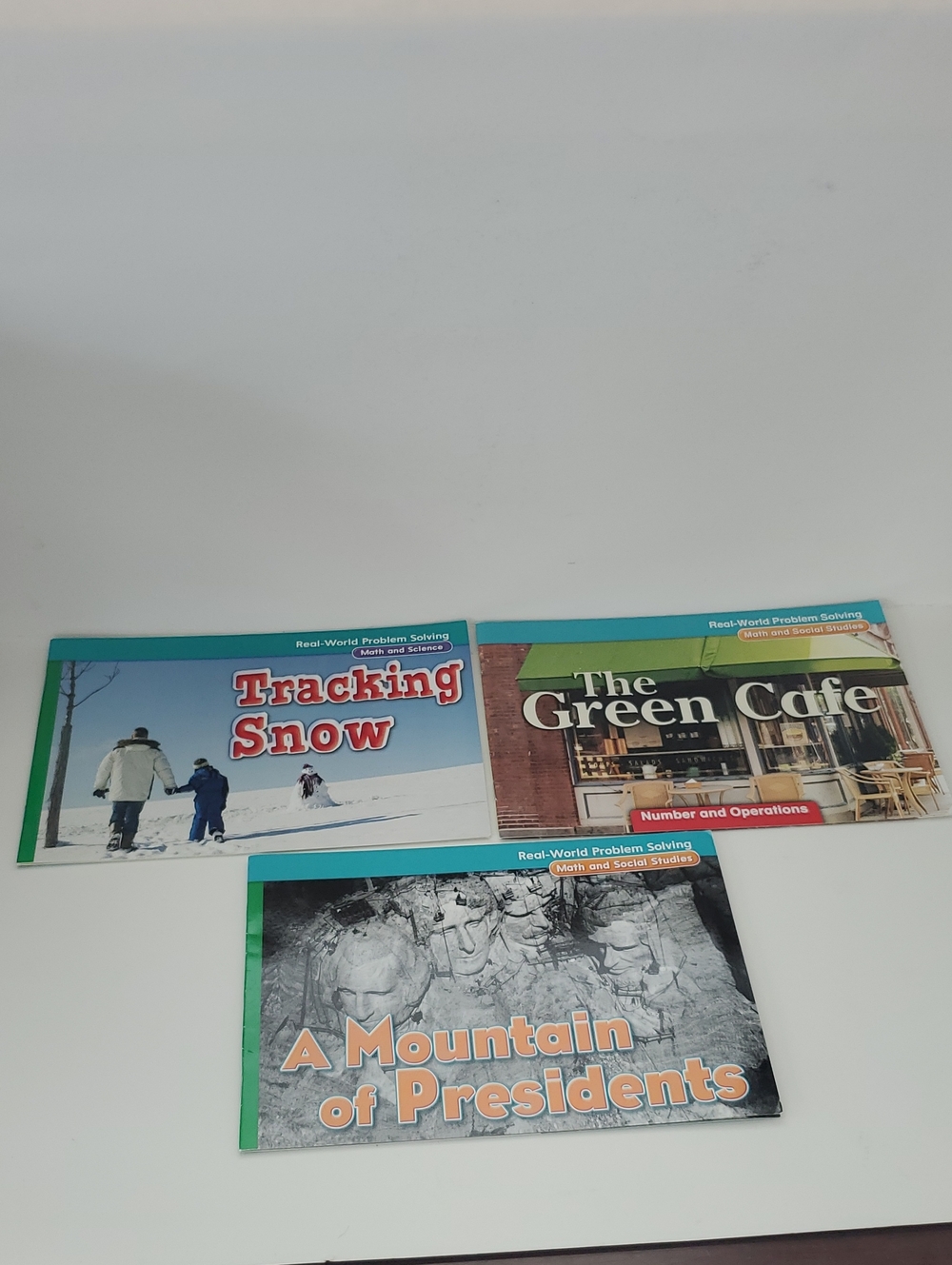 Lot Of 3 Real World Problem Solving Books The Green Cafe, Tracking Snow And. ..